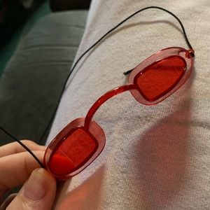 Red tanning bed glasses goggles with elastic tie at back and nose bridge UV safe